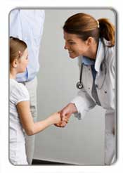 Doctor shaking hands with young girl